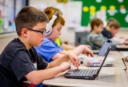 students in school district with student identity provisioning working on their chromebooks in the classroom